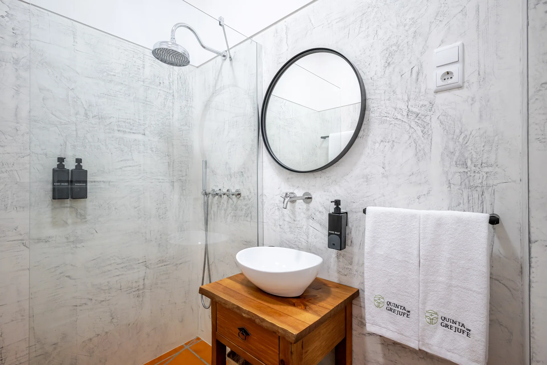 Bathroom with stone washbasin