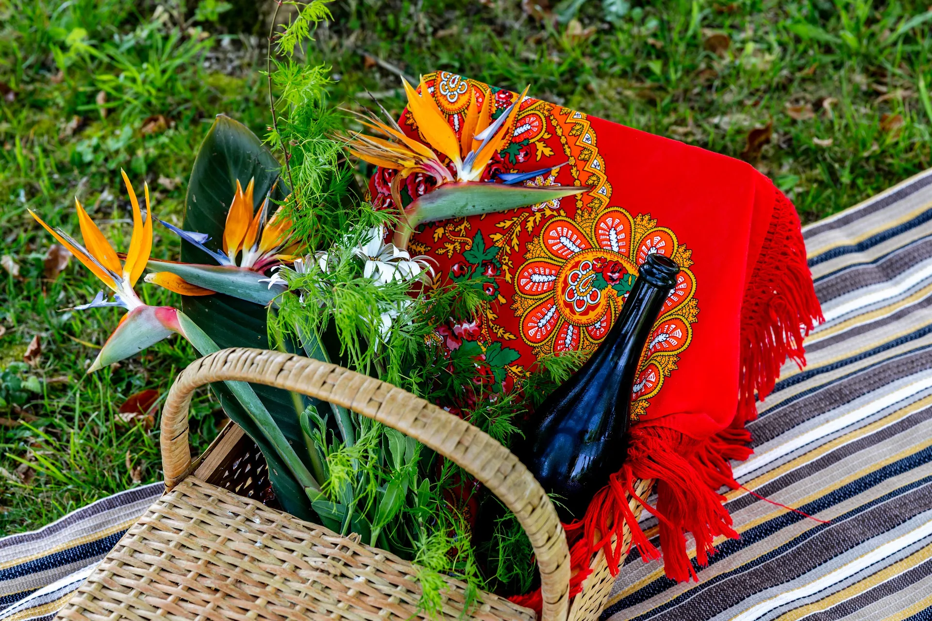 Basket with wine and garden vegetables