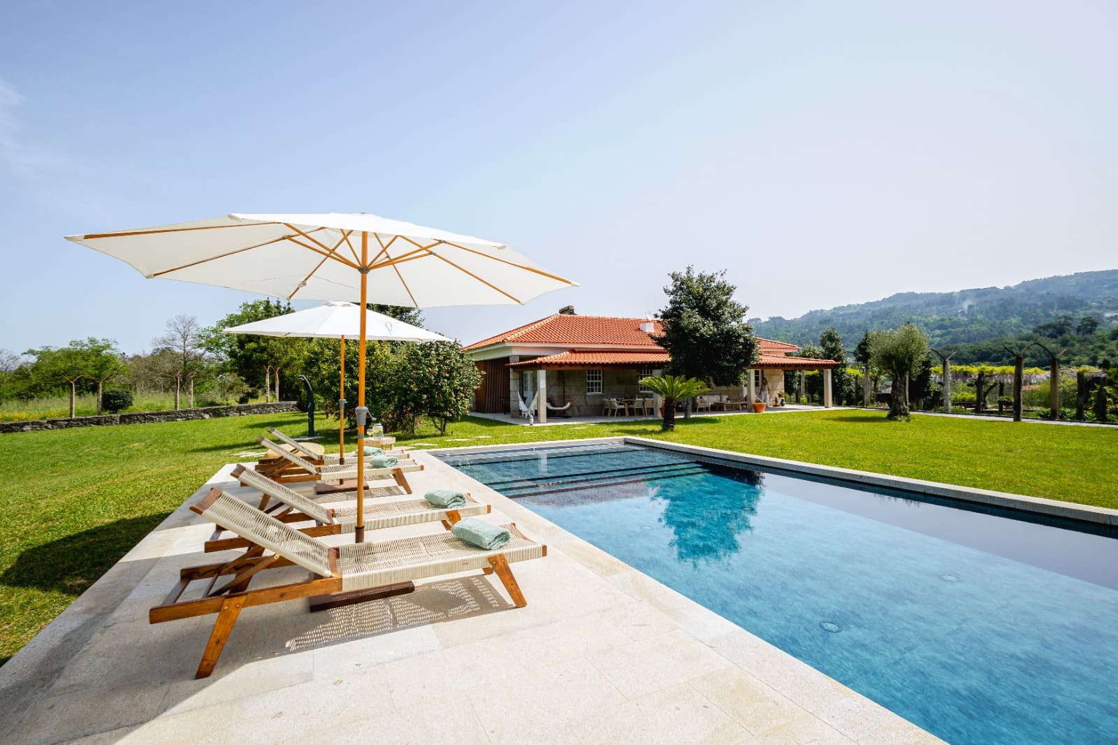 The restored Quinta House with pool and garden